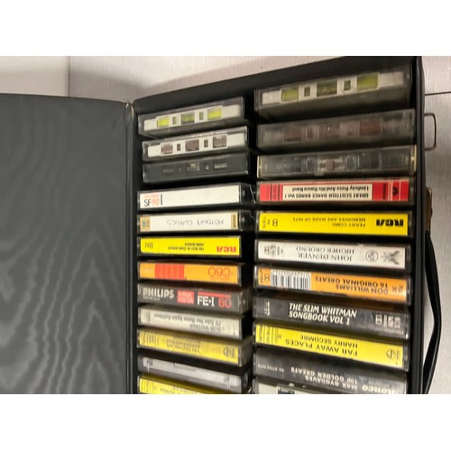 275 - 4 retro carry cases to contain early to modern audio cassettes.