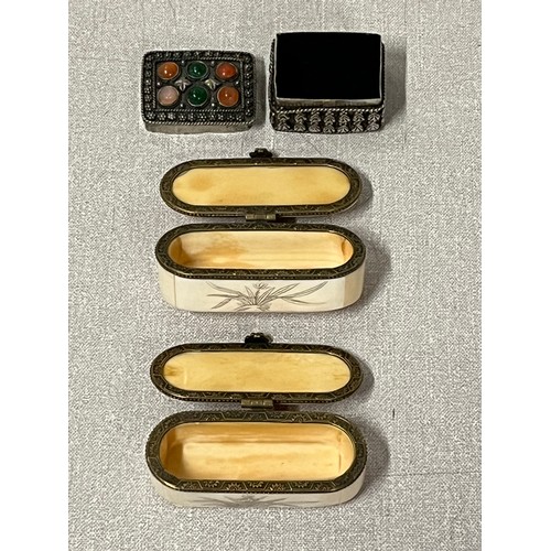 83 - 2 oriental bone snuff/pill boxes along with one other