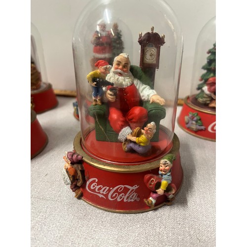 424 - 8 Limited edition Franklin Mint Coke Cola domed Santa's