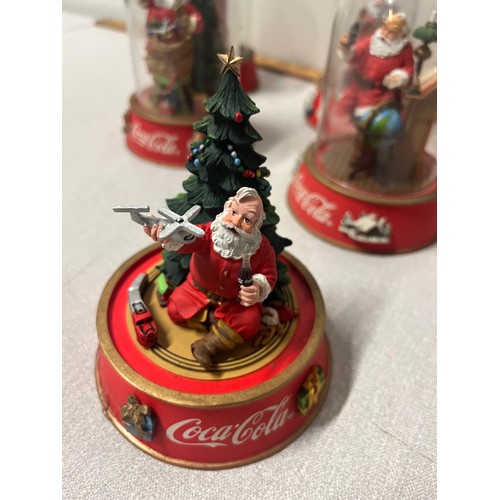 424 - 8 Limited edition Franklin Mint Coke Cola domed Santa's