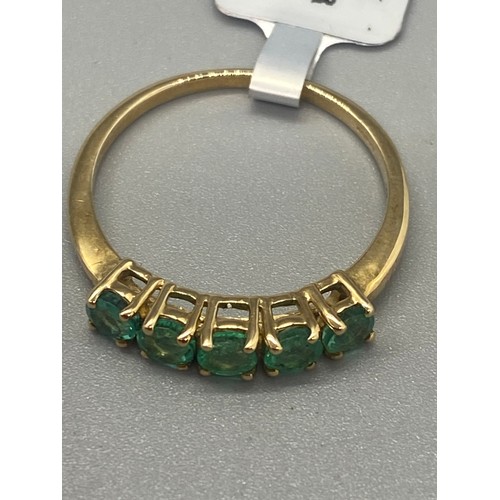 36 - 10k yellow gold and emerald 5 stone ring.