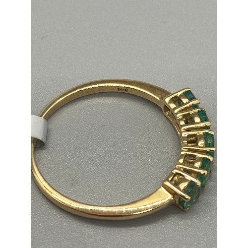 36 - 10k yellow gold and emerald 5 stone ring.