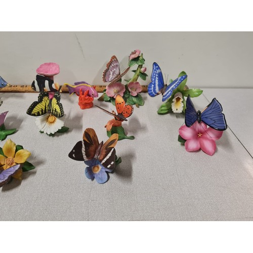 104 - 24 Franklin Mint ceramic butterflies & fish.