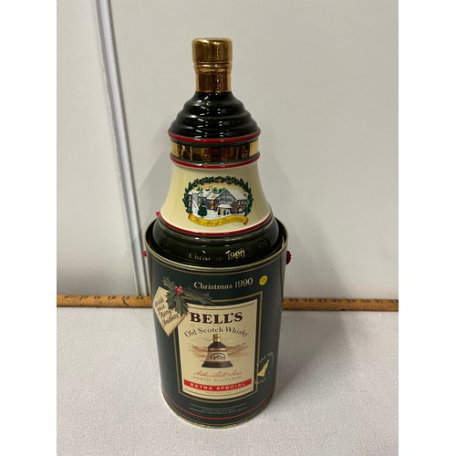 160 - Bells whisky Christmas 1990 decanter with tin full & sealed 75cl