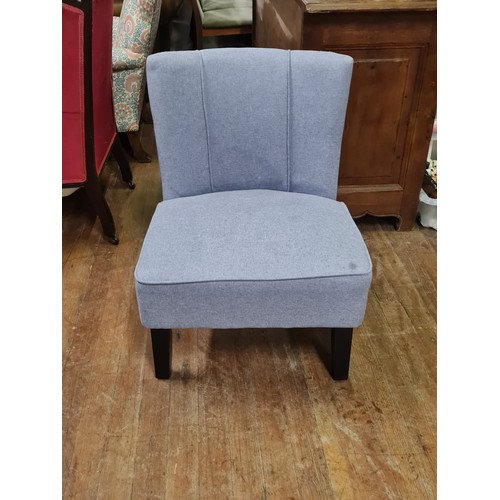 165 - Upholstered armless Occasional chair.