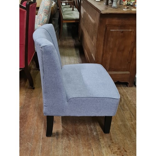 165 - Upholstered armless Occasional chair.