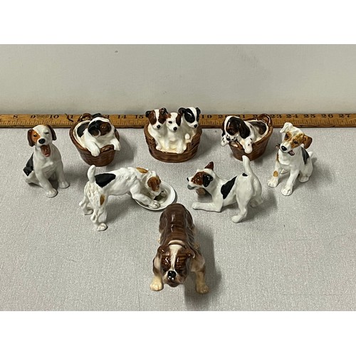 124 - 8 Royal Doulton dogs to include Jack Russell & Bulldog etc.