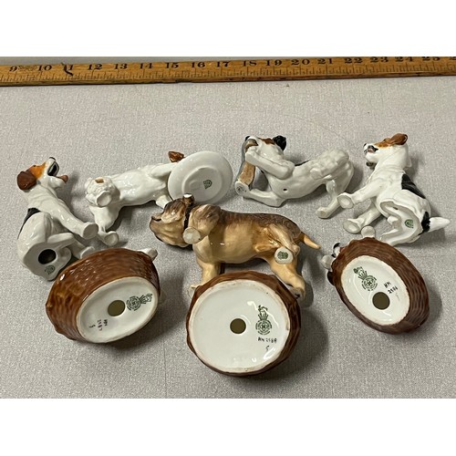 124 - 8 Royal Doulton dogs to include Jack Russell & Bulldog etc.