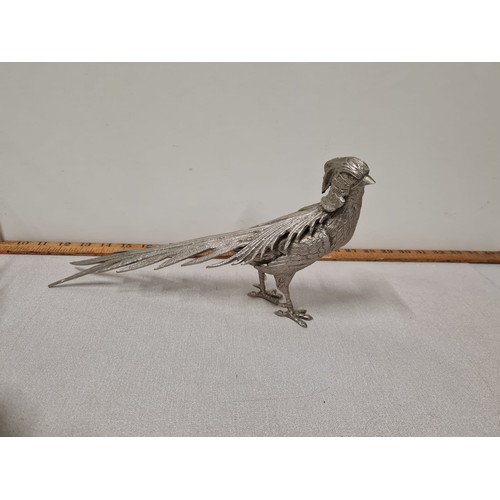 83 - Pair of heavy silver plated pheasants. 35cm long