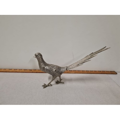 83 - Pair of heavy silver plated pheasants. 35cm long