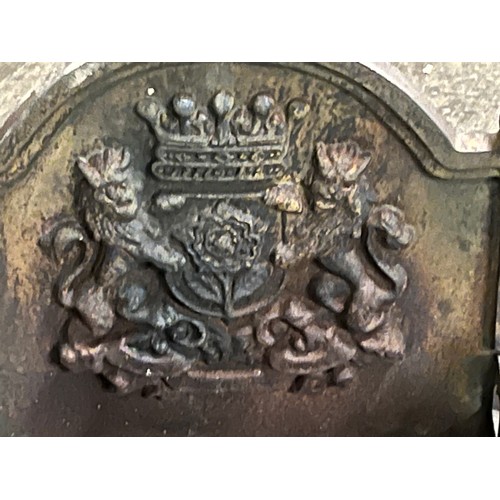 129 - Cast iron fire basket depicting lions, Tudor rose & crown at the back.