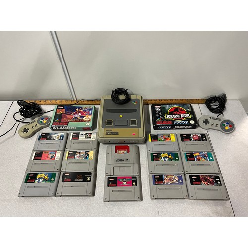 117 - Vintage Super Nintendo with 2 controllers 18 games to include 'Aladdin' & 'Jurassic Park'