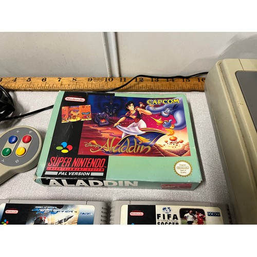 117 - Vintage Super Nintendo with 2 controllers 18 games to include 'Aladdin' & 'Jurassic Park'