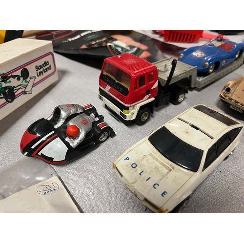 207 - Collection of vintage Scalextric items to include cars, track, figures & stands etc.