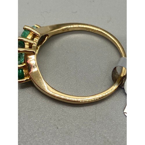 35 - 10k yellow gold and emerald 5 stone ring.