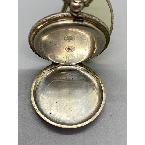 23 - Silver pocket watch case, pocket compass, Le Mans badge and rolled gold religious pendant.