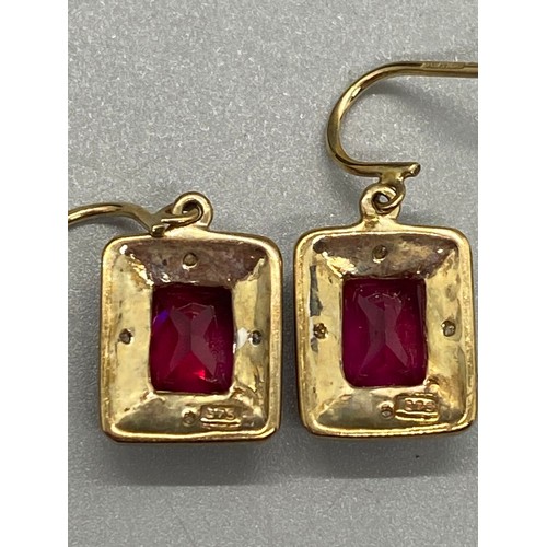 40 - 9ct gold, ruby and diamond chain, pendant and earring set.