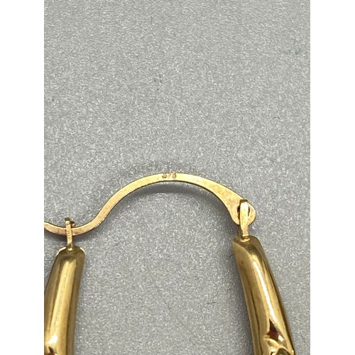 42 - Pair of 9ct yellow gold hoop earrings.