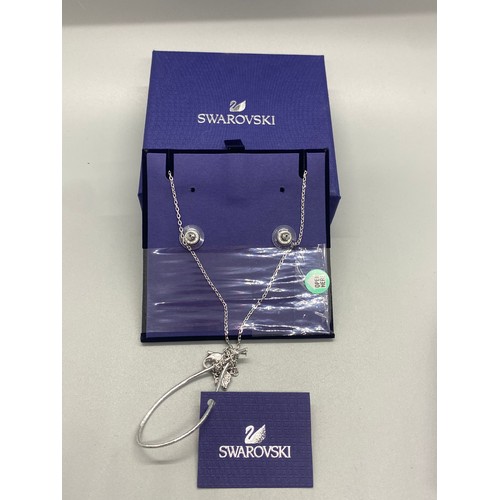 44 - Swarovski Henrietta earring, chain and pendant set. New and sealed in box.