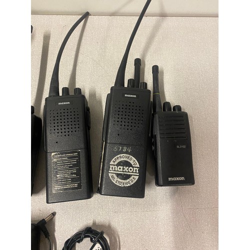 322 - Selection of 9 walkie talkies to include Maxon etc with 2 chargers. (untested)