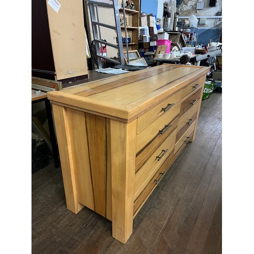 120 - Solid oak 8 drawer chest.