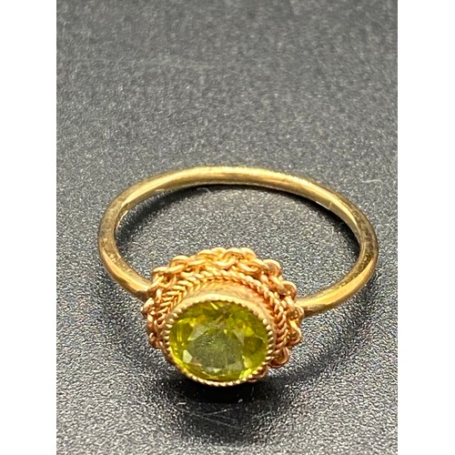 2 - 9ct gold and peridot ring.