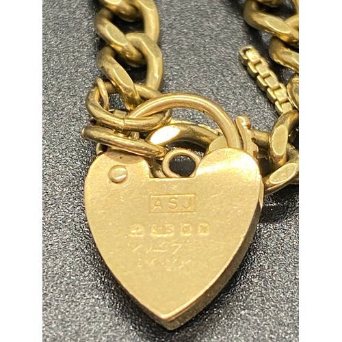 4 - 9ct yellow gold heart lock bracelet. 8.82 grams