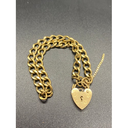 4 - 9ct yellow gold heart lock bracelet. 8.82 grams