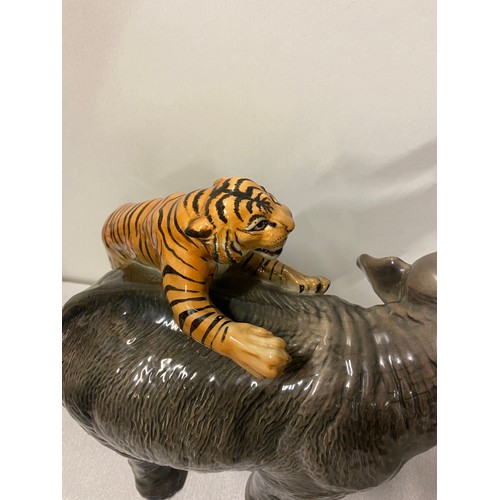 213 - Large Vintage Italian Giovanni Ronzan porcelain elephant & tiger in attack signed. 40cm long