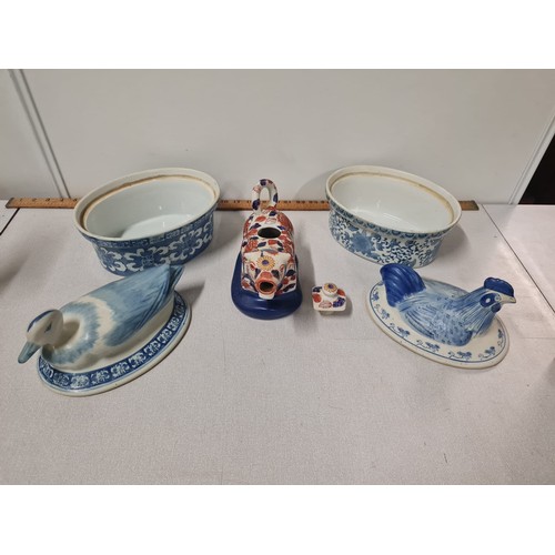 142 - 2 vintage blue & white ceramic egg holders along with Amari pattern cow creamer signed