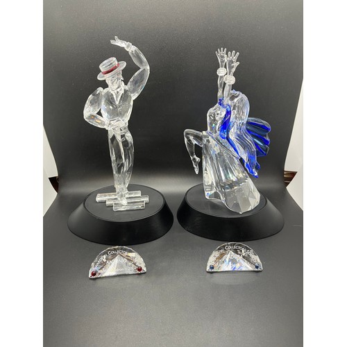 166 - 2 large boxed swarovski figurines antonio & isador with stands