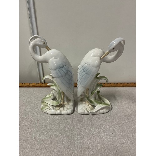 179 - a pair of ceramic fitz & floyd japan heron book ends 19cms tall