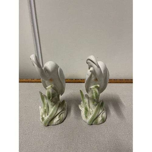 179 - a pair of ceramic fitz & floyd japan heron book ends 19cms tall