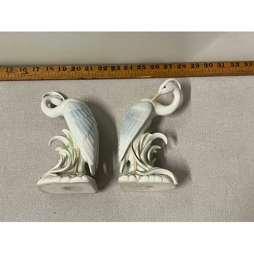 179 - a pair of ceramic fitz & floyd japan heron book ends 19cms tall