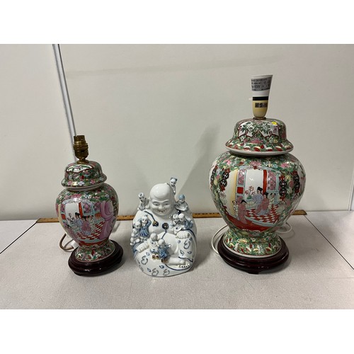 77 - 2 chinese famille rose lamps along with ceramic buddha