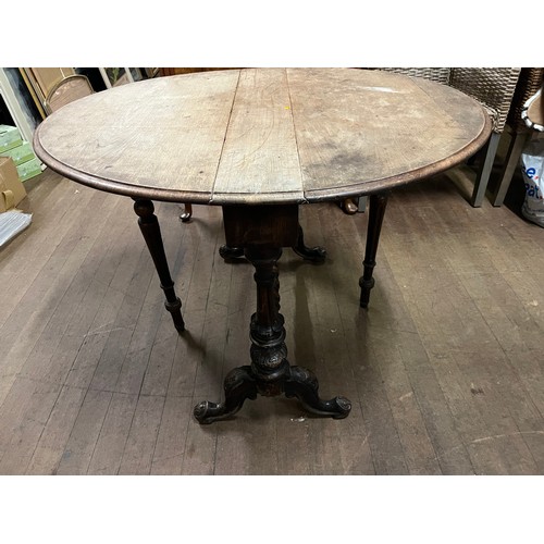 79 - antique carved wooden drop leaf table