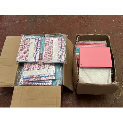 469 - 2 large boxes of tablet/ipad covers