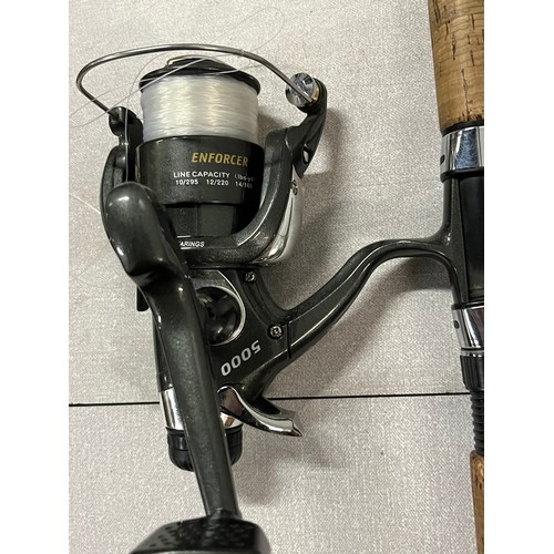 473 - enforcer 5000 fishing reel along with trion royalty spinning rod