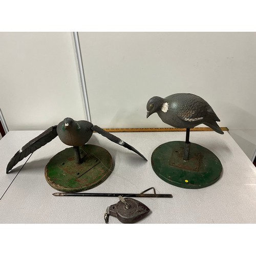 47 - Pair of plastic decoy pigeons on stands