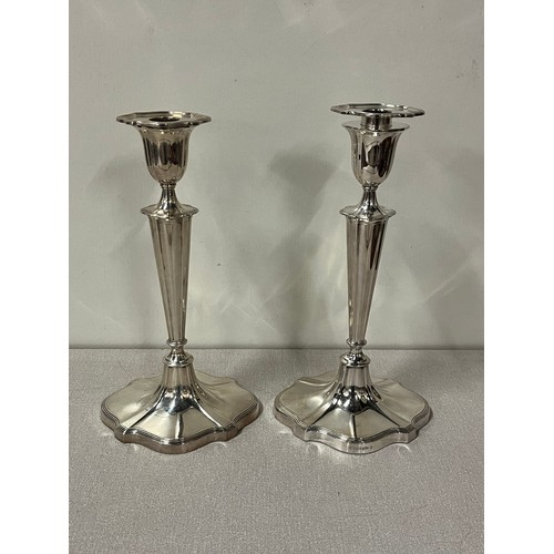 65 - Large pair of good quality silver plated candle sticks by Walker & Hall with removable toppers. 
30c... 