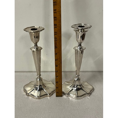 65 - Large pair of good quality silver plated candle sticks by Walker & Hall with removable toppers. 
30c... 