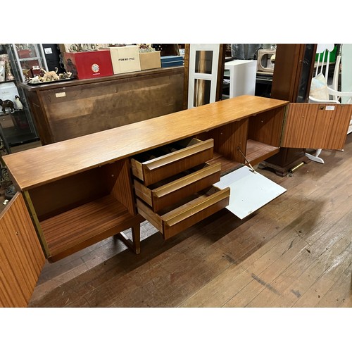 93 - Mid century Stonehill Furniture Ltd teak sideboard.
72cm x 198cm x 45cm