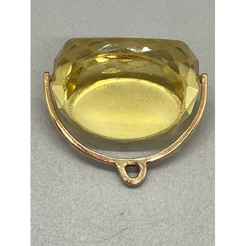 143 - large gold & citrine fob. Gold testing over 10k.