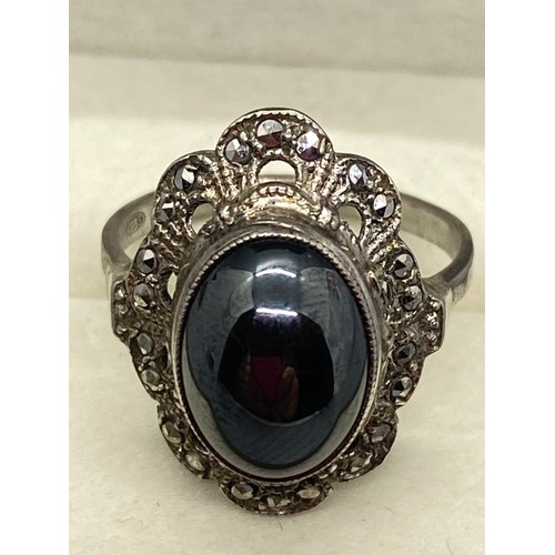 145 - silver black onyx & marcasite ring along with silver & amber brooch