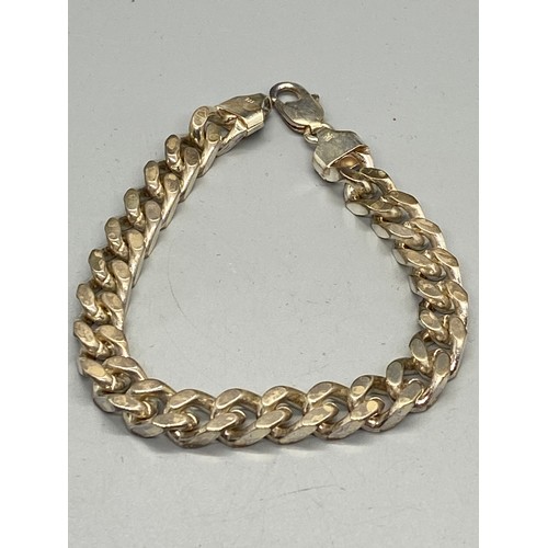 188 - heavy hallmarked silver curb bracelet 48.28 grams