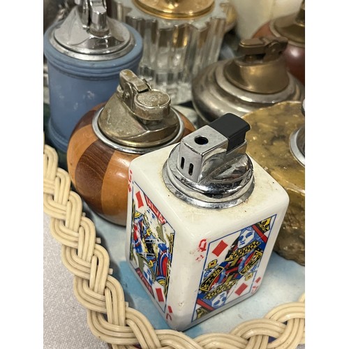 134 - Collection of 26 vintage table lighters.