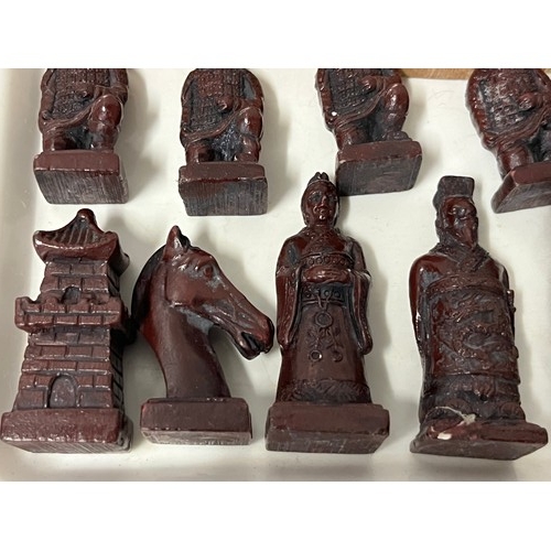 96 - Resin chess set depicting the terracotta warriors of Xi'an. tallest 6cm