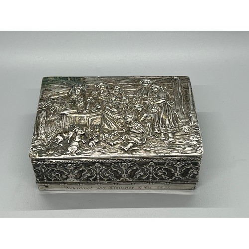 26 - Antique german raised relief 800 grade silver box , lid dipicting family & animals