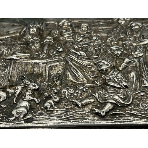 26 - Antique german raised relief 800 grade silver box , lid dipicting family & animals