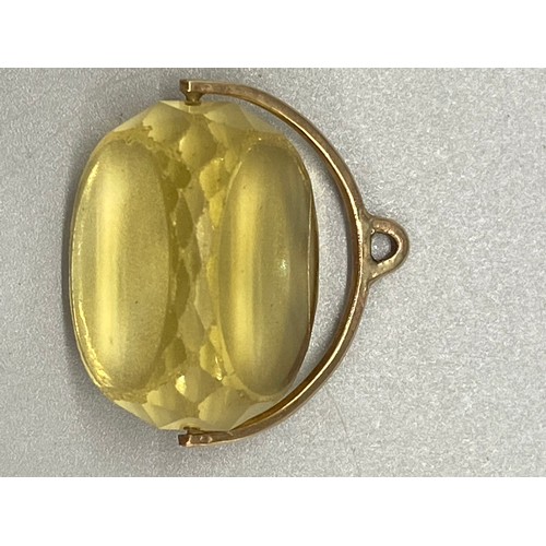 143 - large gold & citrine fob. Gold testing over 10k.